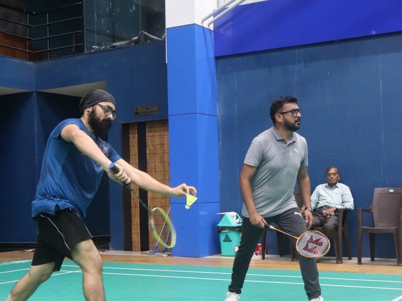 Members playing badminton